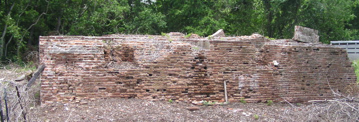 Steam Engine base shows notches where [first] the sugar juice and [second] the crushed cane were channeled.